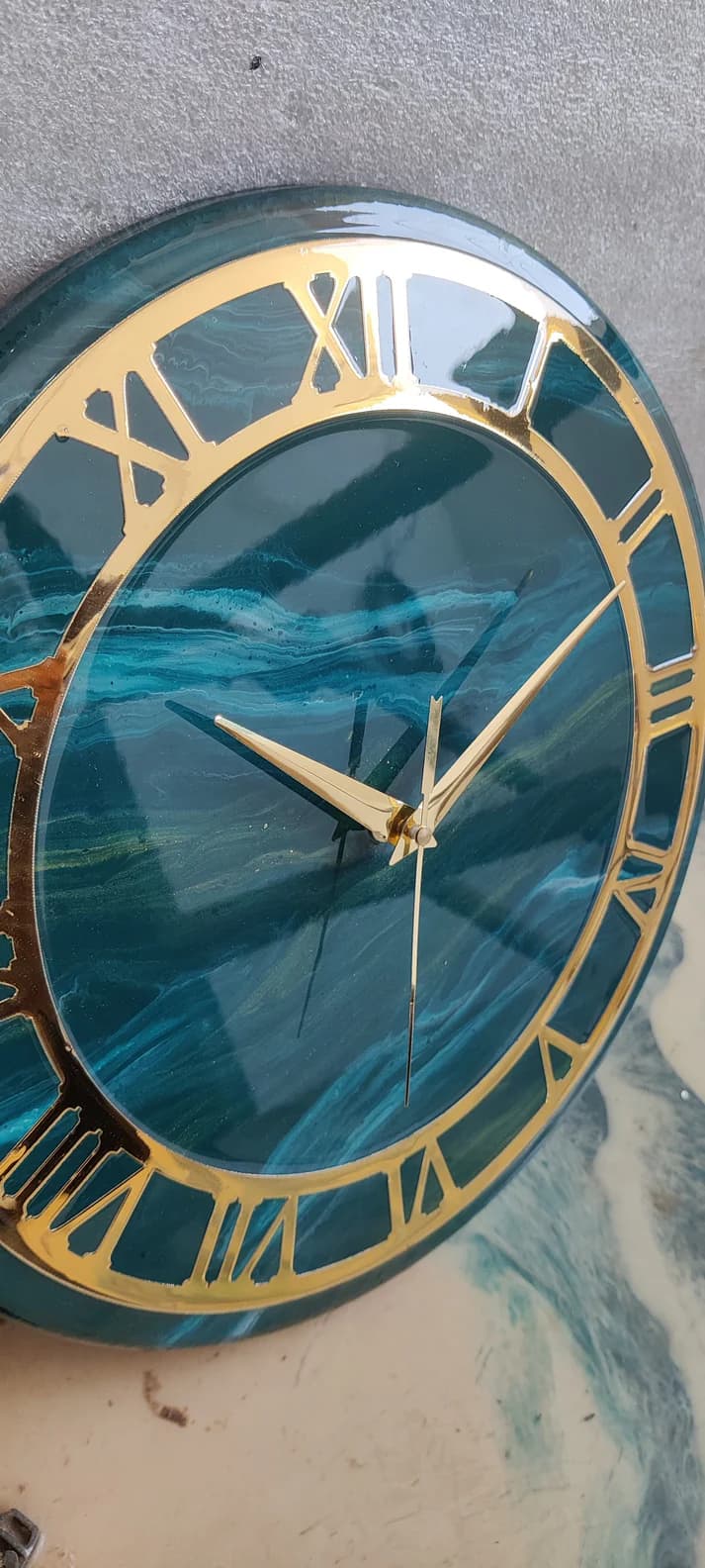 Silent sweep movement on shiny green wall clock