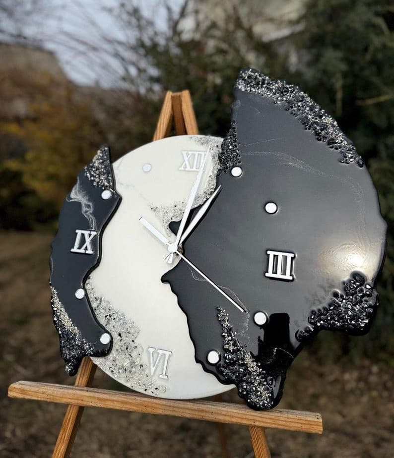 Modern designer monochrome resin wall clock with silver Roman numerals