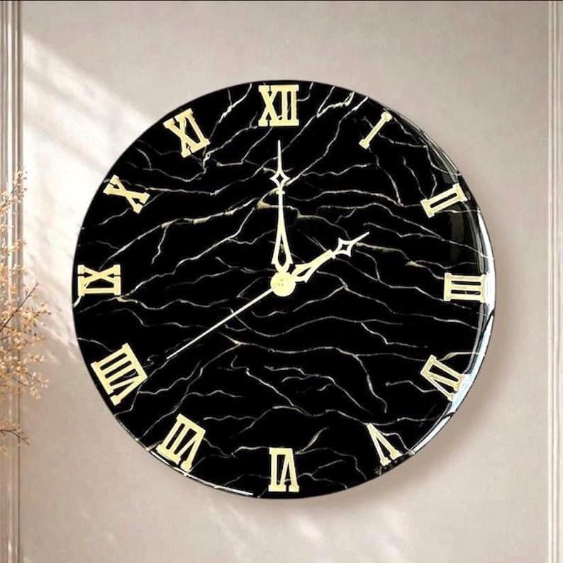 Obsidian Noir black marble resin wall clock with gold Roman numerals and silent movement