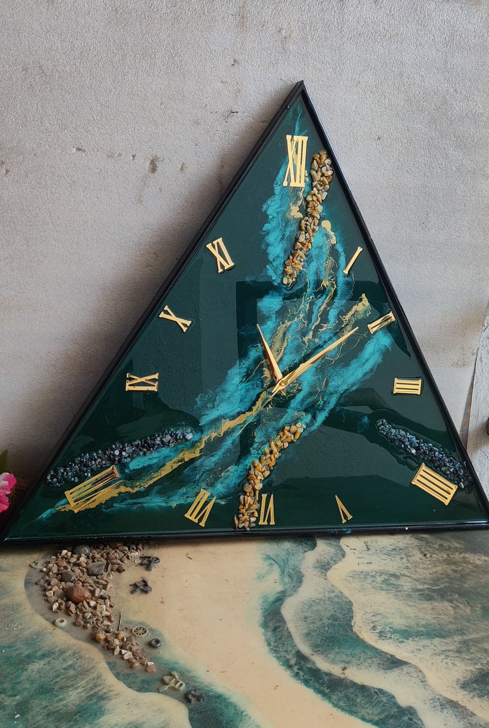Unique triangular wall clock mounted in contemporary Indian home